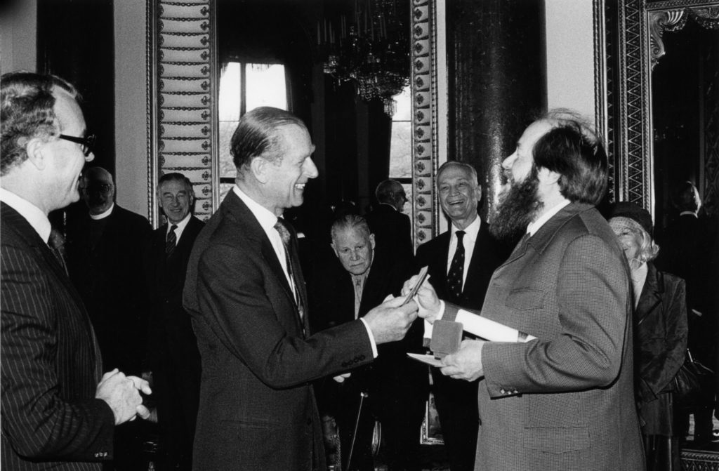 Michael Bourdeaux 1984 Laureate of Templeton Prize accepting award from Prince Philip, Duke of Edinburgh at palace