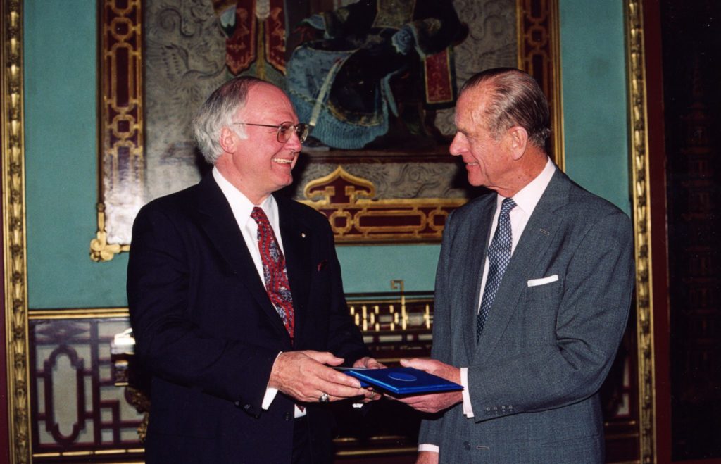 Michael Novak 1994 Laureate of Templeton Prize accepting award from Prince Philip, Duke of Edinburgh at Palace
