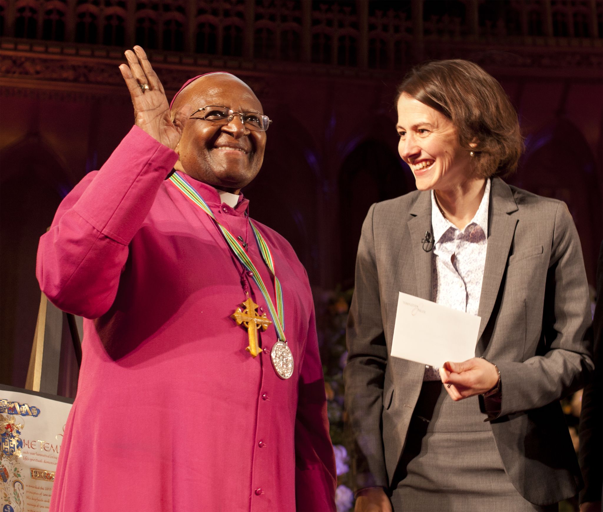 Desmond Tutu 2013 Laureate of Templeton Prize smiling and waving at Prize Ceremony
